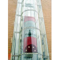 Современный стеклянный лифт здания